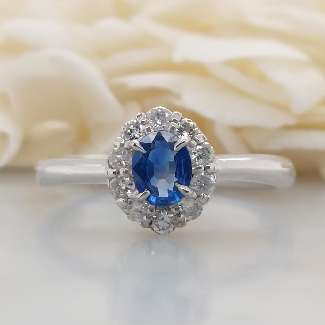 Vintage Oval Sapphire and Diamond Cluster Platinum Ring